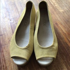 Women’s gold/maize yellow colored wedge size 6